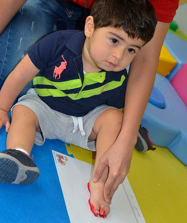 An infant in abu dhabi doing a sensory activity, Les Fanfans Nursery